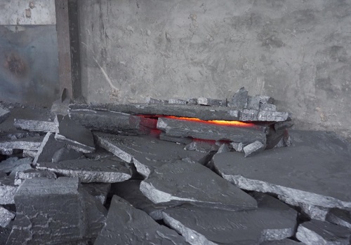 ferro silicon ingot on the ground of factory is being cooling down,with silver-gray luster