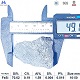 Ferro silicon 72% 10-50mm lump size overview with ruler for size reference and chemical composition specifications table