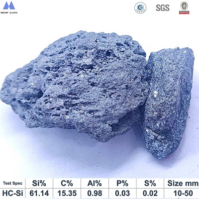 High carbon silicon grade 6015 (C60% Si15%) lump appearance showing metallic luster, dark gray to black color, typical irregular lump shape, with chemical composition specifications table below