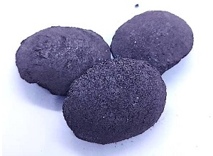 Silicon briquette 65% appearance showing typical pillow-shaped briquette,dark gray color,smooth surface texture