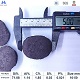 Silicon briquette 65% diameter measurement with ruler showing width dimension, typical pillow-shaped briquette, with chemical composition specifications table below