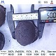 Silicon carbide briquette 65 diameter measurement with ruler showing width dimension, typical pillow-shaped briquette, with chemical composition specifications table below